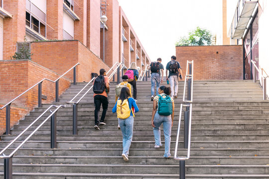 Students walking on campus during celebration